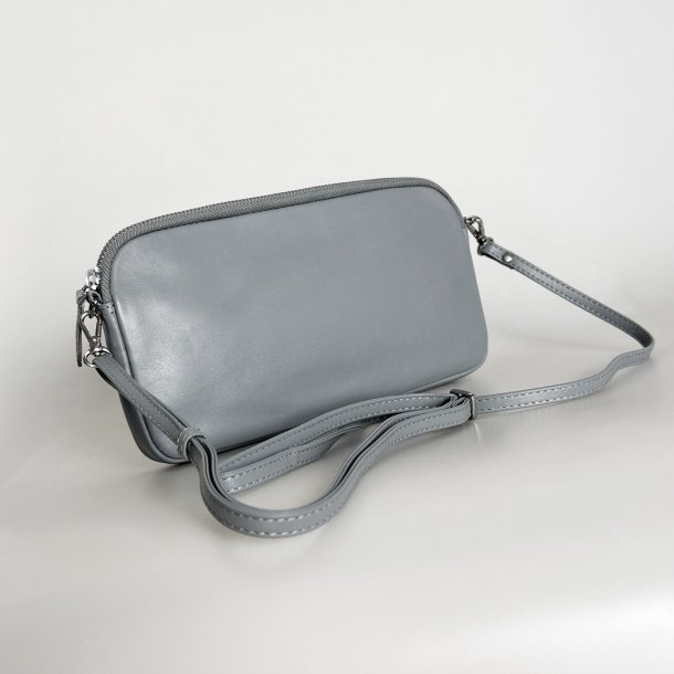 Abina, Belsac lys bl crossbody i skind med lang regulerbar rem