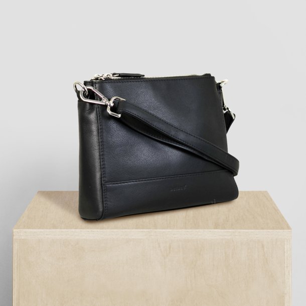Florentina, Belsac sort crossbody i skind med toplynls og bred bund