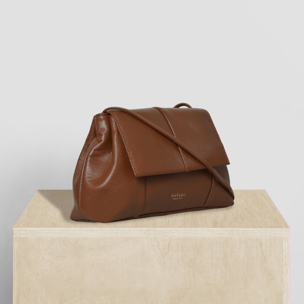 Osiris, Belsac cognac crossbody/clutch i bldt skind med aftagelig rem