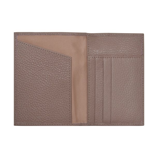 Belsac lys rosa pascover i skind med lynlsrum til mnter, samt plads til sedler og kort